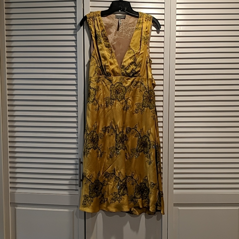 Sleeveless silk embroidered dress, size 4